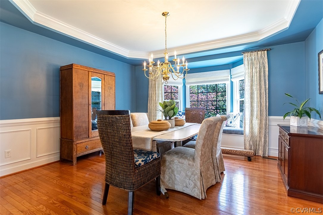 14006 Planters Walk Drive Midlothian, VA 23113 - Photo 11 of 48 a view of a dining room with furniture window and wooden floor