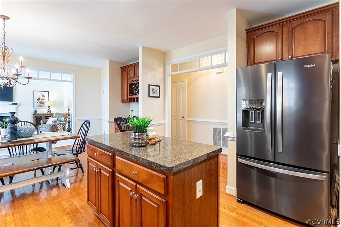 14006 Planters Walk Drive Midlothian, VA 23113 - Photo 15 of 48 a kitchen with stainless steel appliances granite countertop a refrigerator a stove and a sink