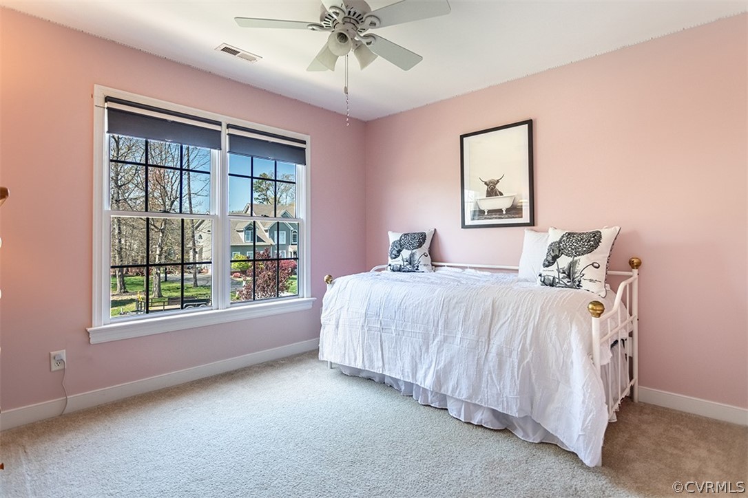 14006 Planters Walk Drive Midlothian, VA 23113 - Photo 23 of 48 a bedroom with a bed and a window