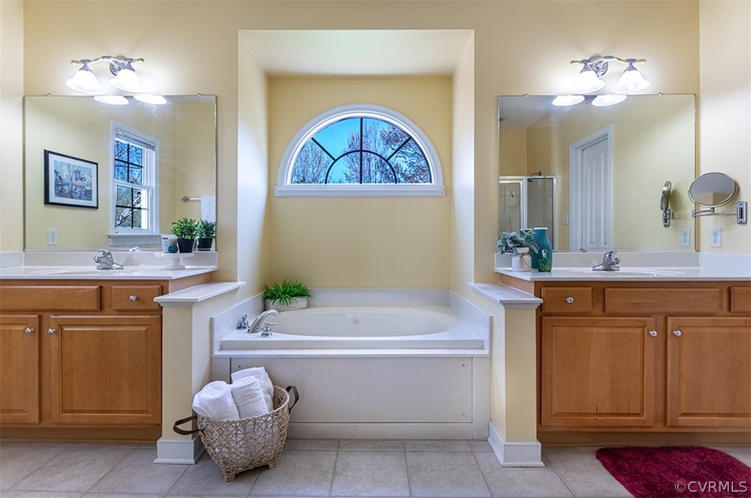 14006 Planters Walk Drive Midlothian, VA 23113 - Photo 27 of 48 a bathroom with a sink a vanity and a mirror