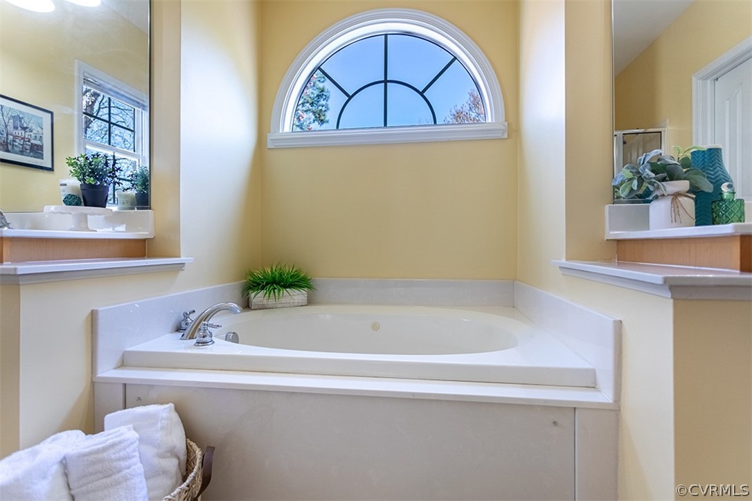14006 Planters Walk Drive Midlothian, VA 23113 - Photo 28 of 48 a bathroom with a sink and a mirror