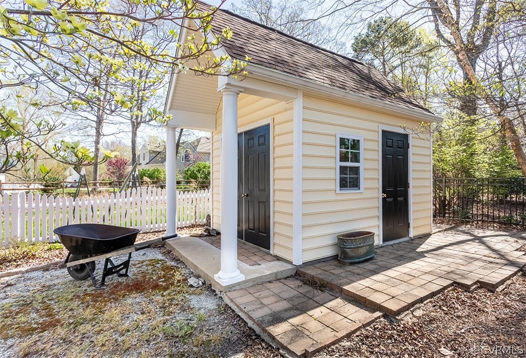14006 Planters Walk Drive Midlothian, VA 23113 - Photo 40 of 48 a backyard of a house with fire pit and outdoor seating