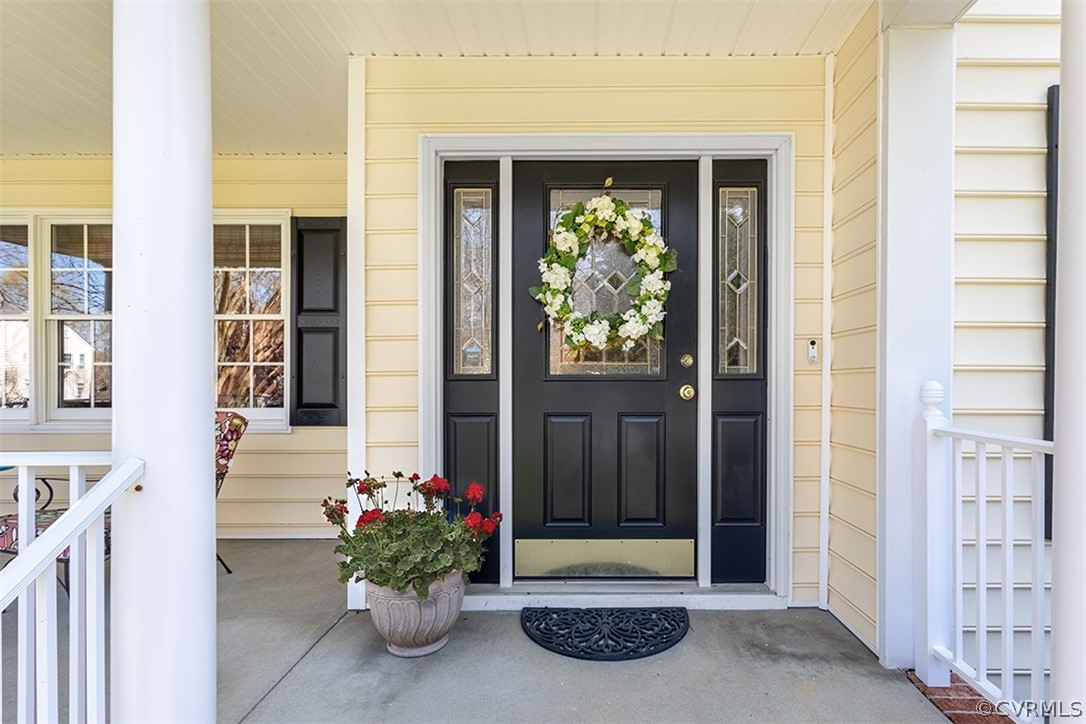 14006 Planters Walk Drive Midlothian, VA 23113 - Photo 4 of 48 a front view of a house with a porch
