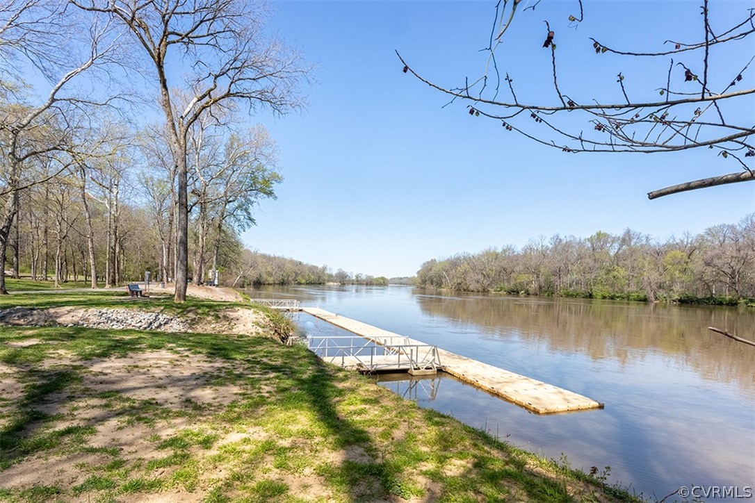 14006 Planters Walk Drive Midlothian, VA 23113 - Photo 47 of 48 a view of a lake with a mountain in the background