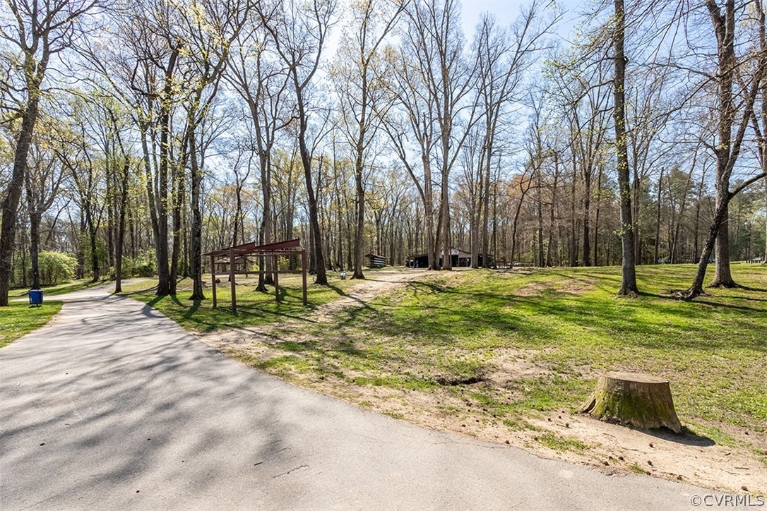 14006 Planters Walk Drive Midlothian, VA 23113 - Photo 48 of 48 a backyard of a house with lots of green space