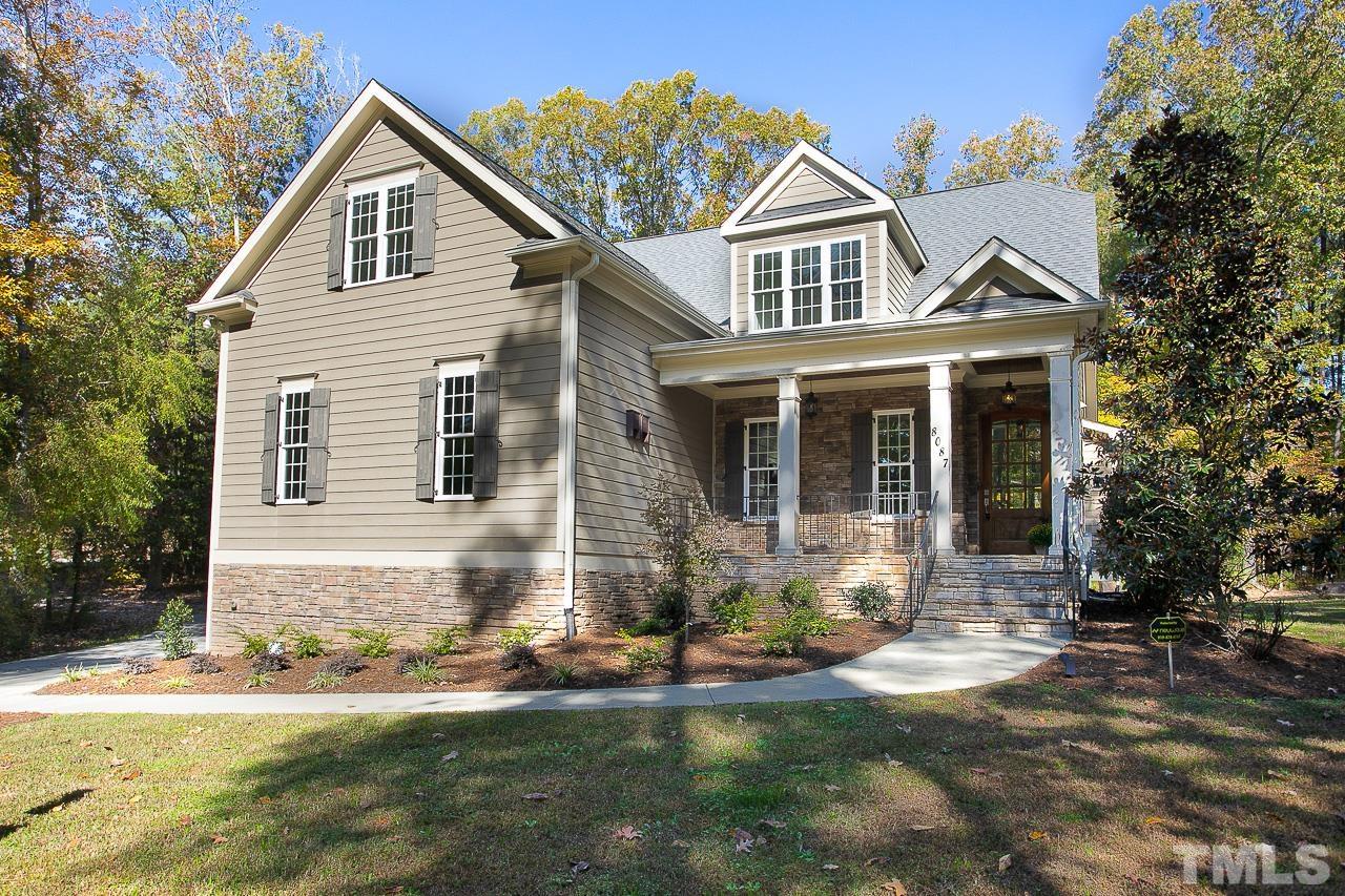 8087 Wake Road Durham, NC 27713 - Photo 1 of 30 a front view of a house with a yard