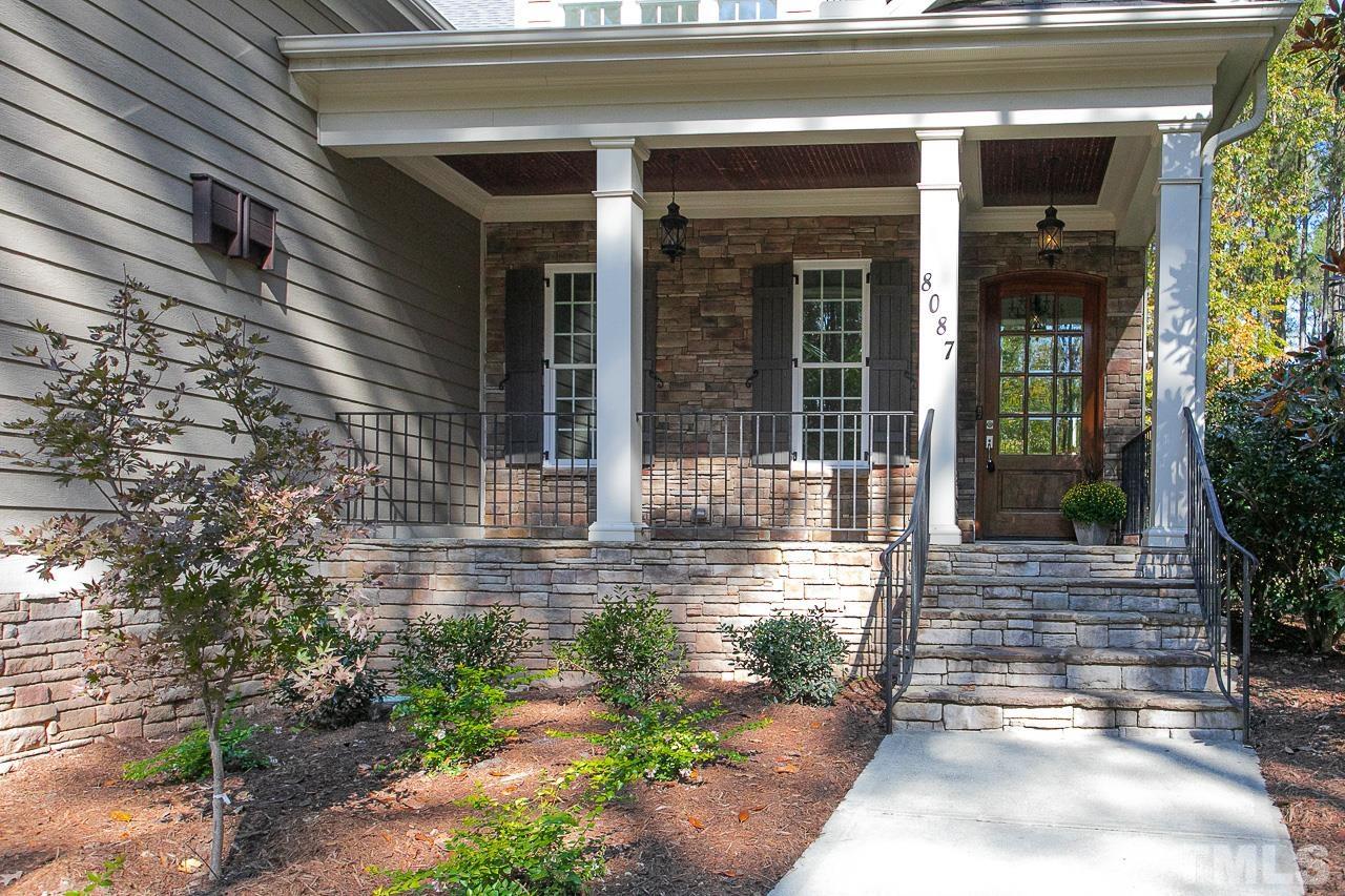 8087 Wake Road Durham, NC 27713 - Photo 2 of 30 a view of house with small garden
