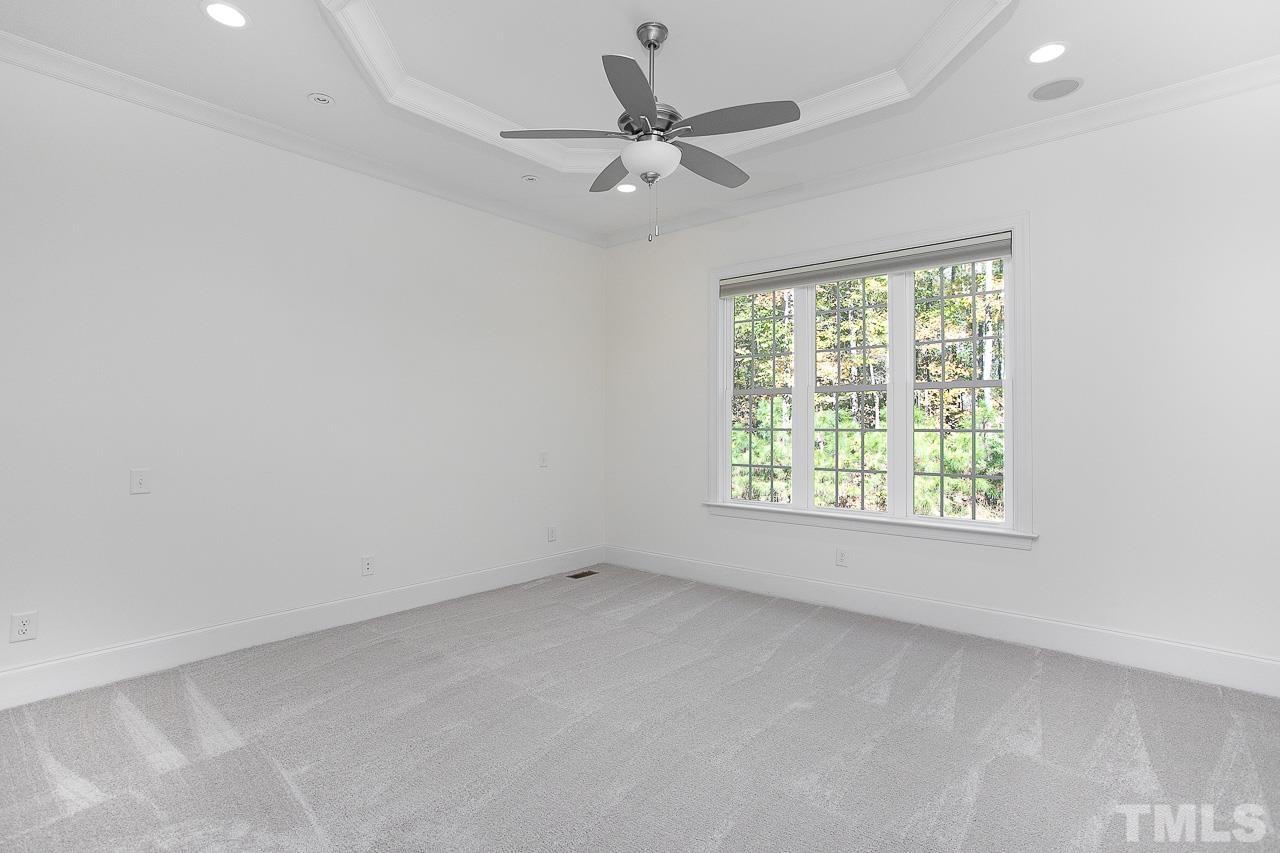 8087 Wake Road Durham, NC 27713 - Photo 17 of 30 an empty room with a window