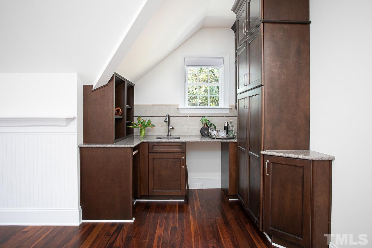 8087 Wake Road Durham, NC 27713 - Photo 25 of 30 a kitchen with stainless steel appliances a refrigerator and a window