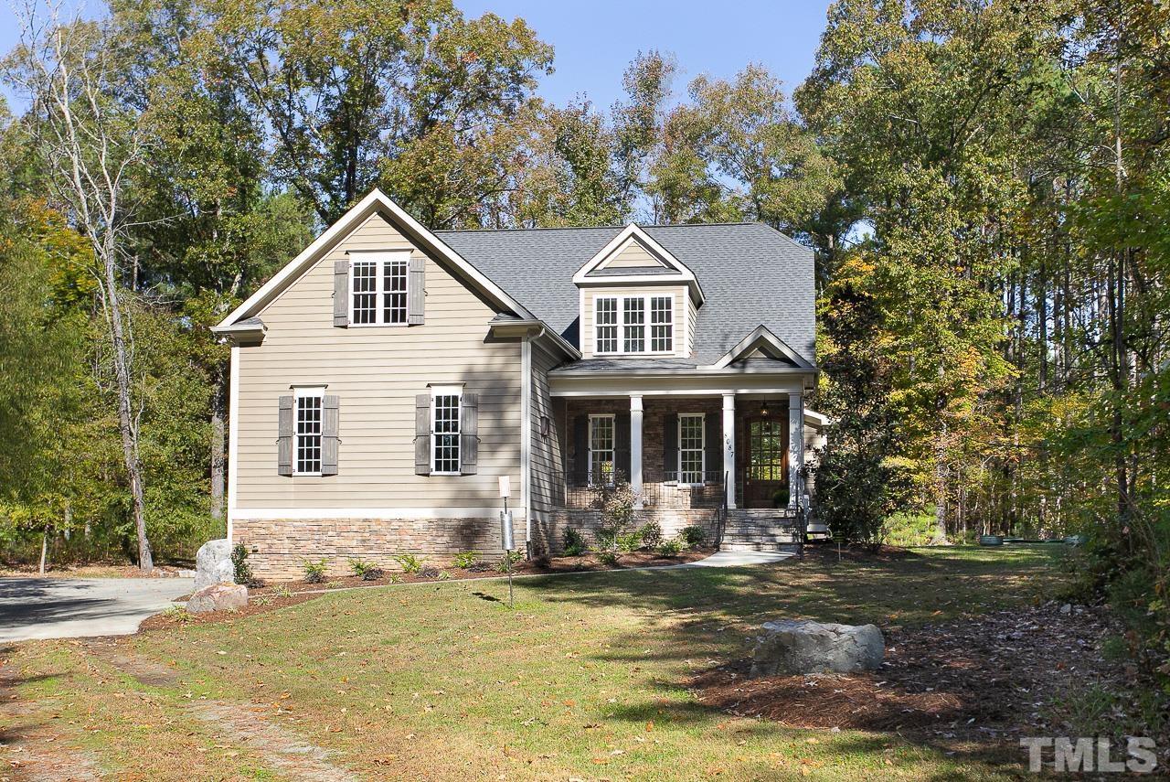 8087 Wake Road Durham, NC 27713 - Photo 30 of 30 a front view of a house with a yard