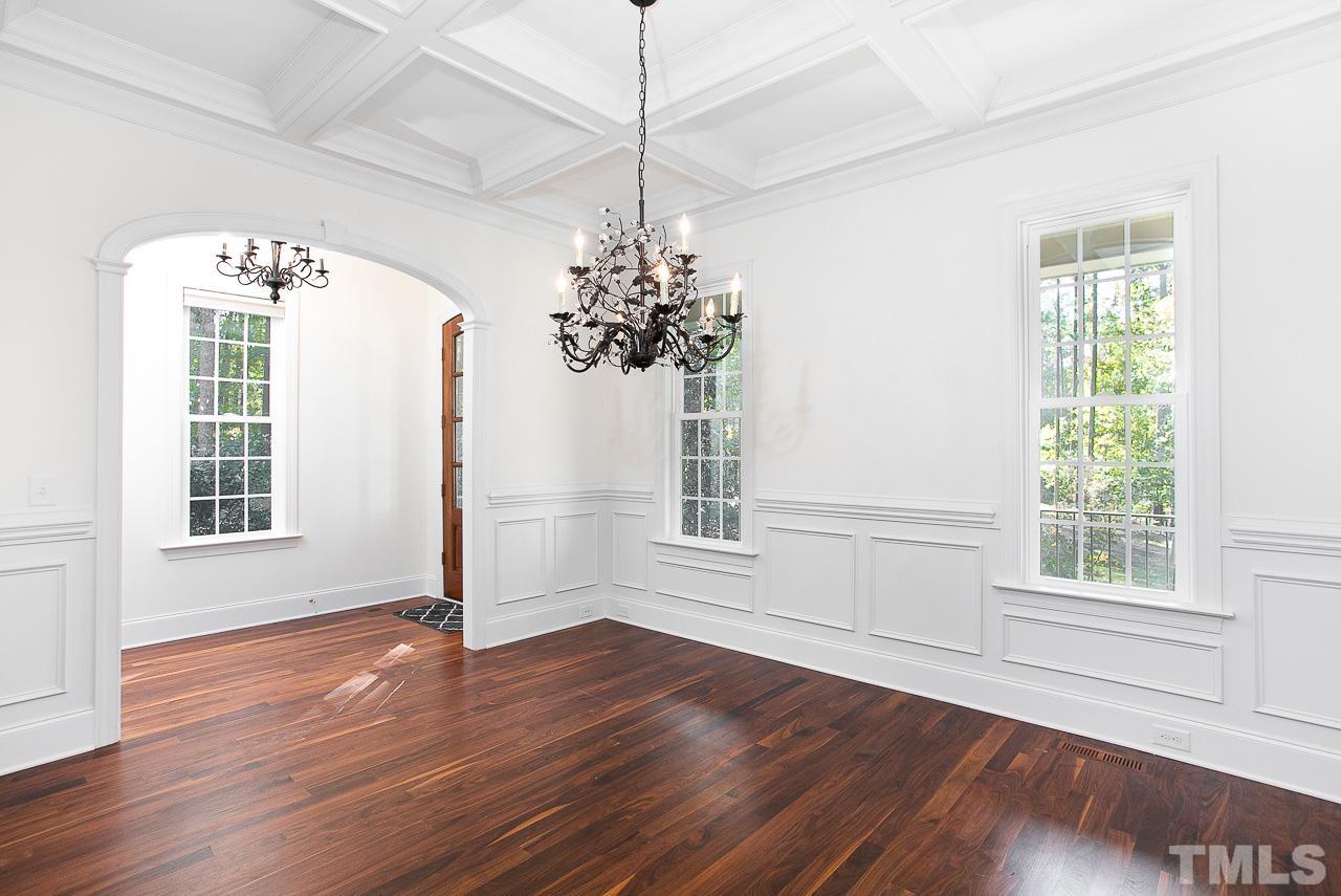 8087 Wake Road Durham, NC 27713 - Photo 5 of 30 a view of a room with wooden floor and windows