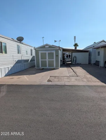 a front view of a house with a garage