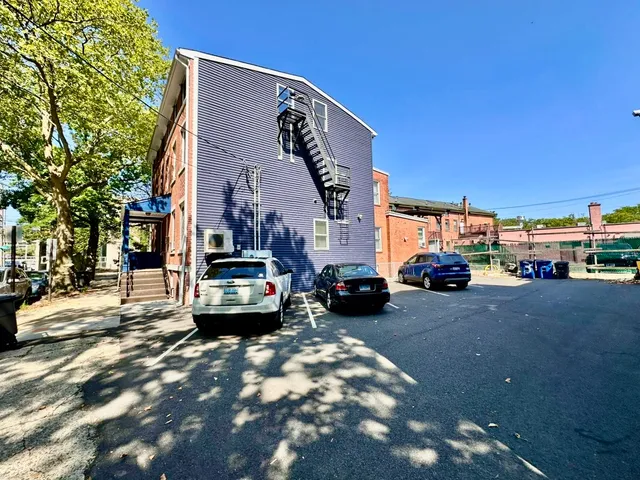 a car parked in front of a building