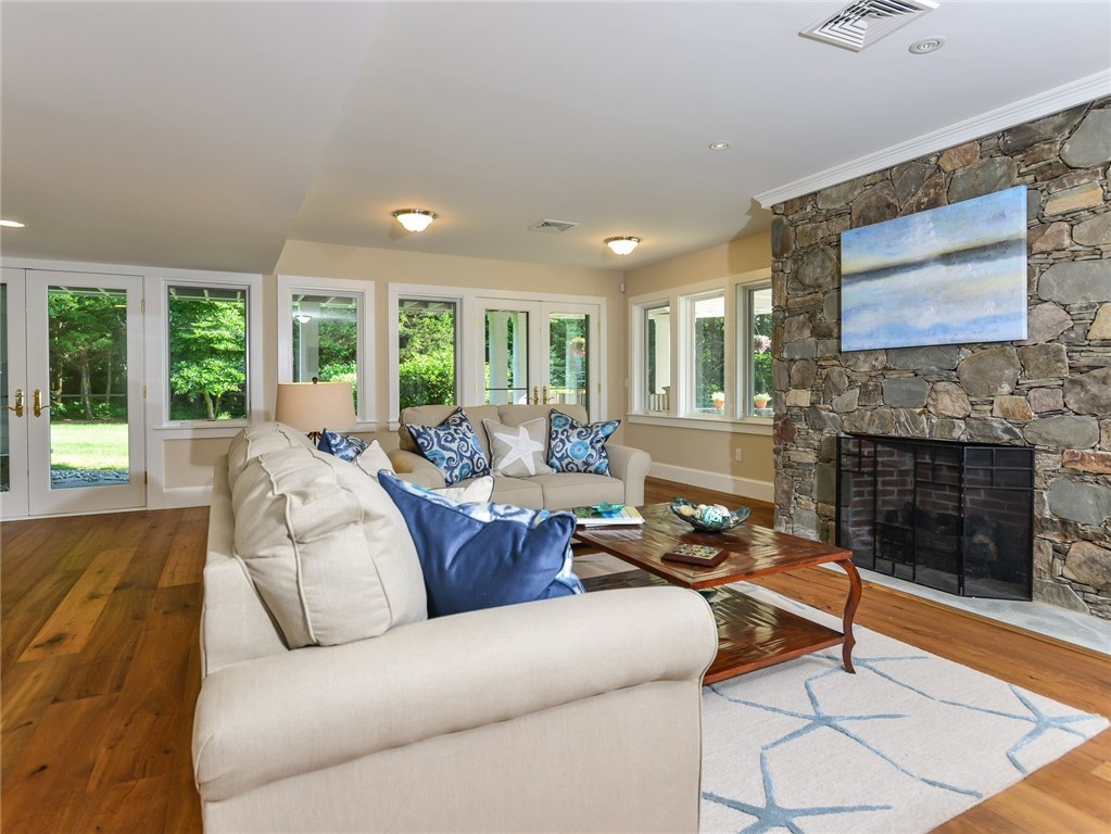 1173 North Main Road Jamestown, RI 02835 - Photo 33 of 40 Family Room On Lower Walk-Out Level Opens to Pool and Patio