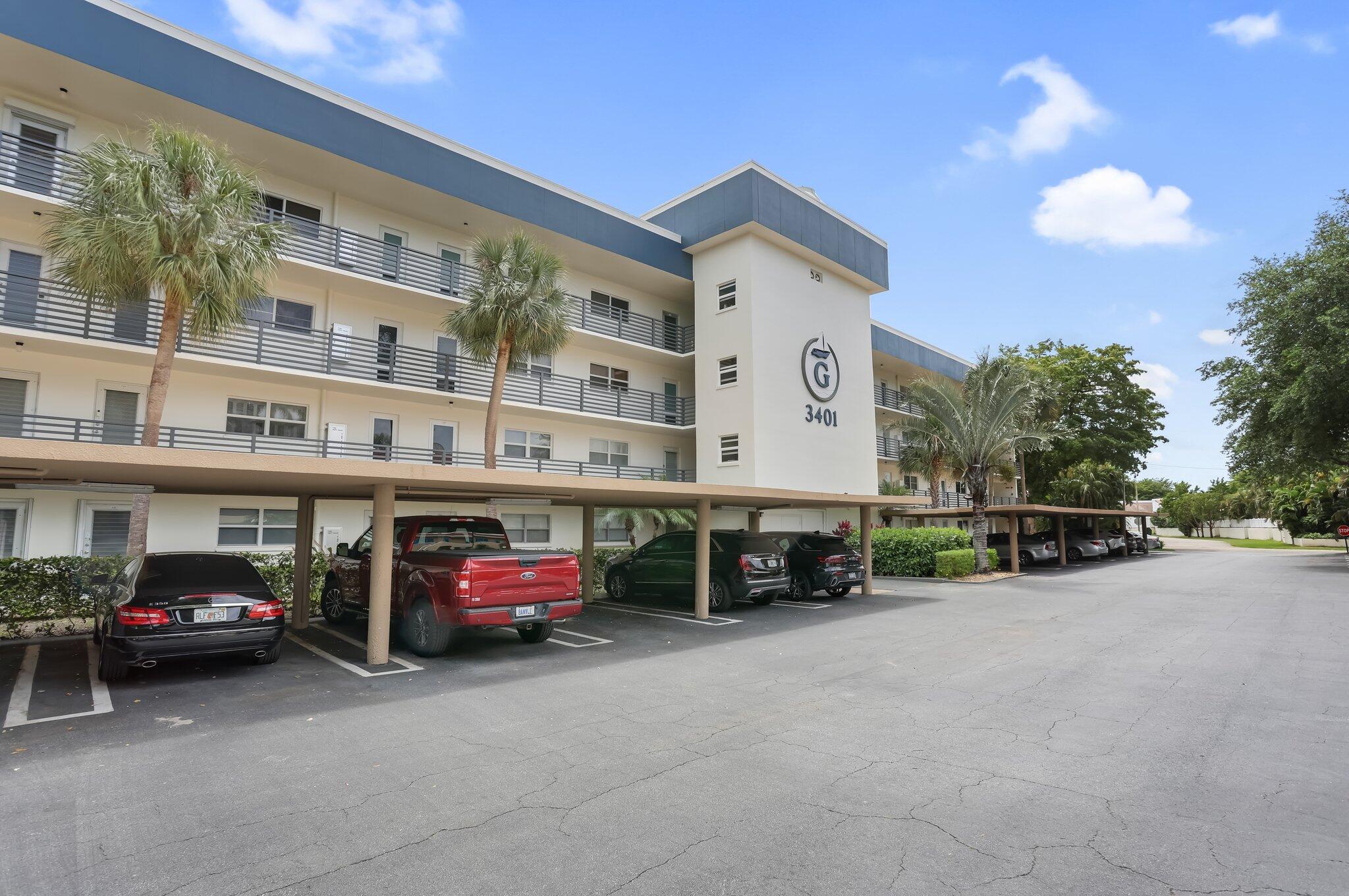 3401 Spanish Trail, Unit 151 Delray Beach, FL 33483 - Photo 11 of 20 a car parked in front of a building