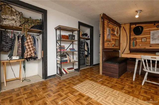 a bedroom with furniture and window