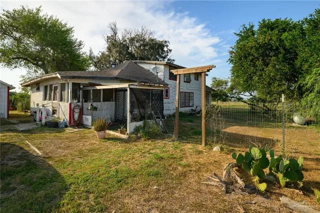 a view of a house with garden