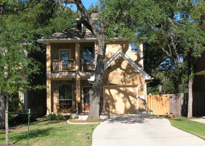 4526 Merle Drive Austin, TX 78745 - Photo 1 of 1 a front view of a house with a yard