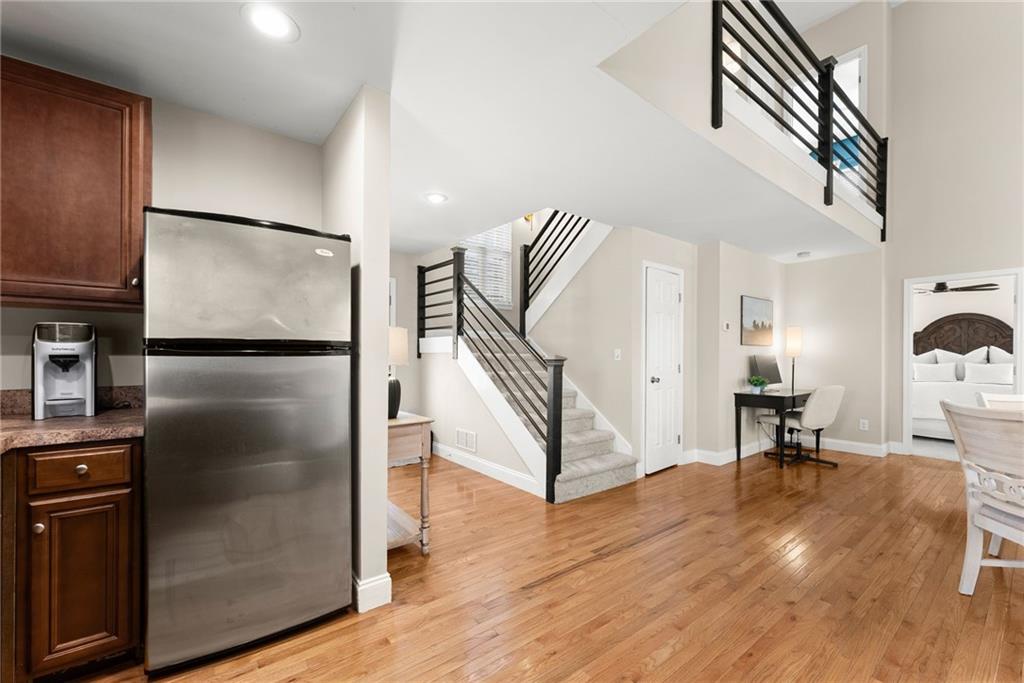 3211 The Trail Road Gainesville, GA 30501 - Photo 13 of 35 a view of a kitchen with furniture and a refrigerator