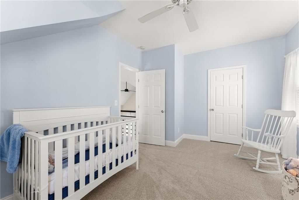 3211 The Trail Road Gainesville, GA 30501 - Photo 18 of 35 a view of a bedroom with wooden floor