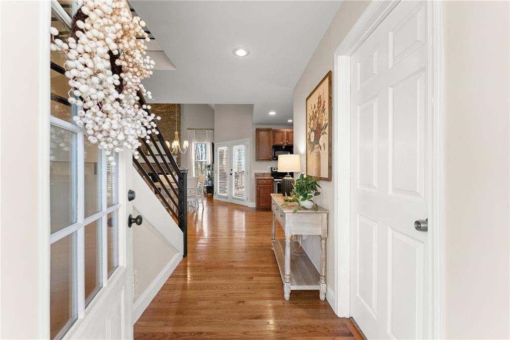 3211 The Trail Road Gainesville, GA 30501 - Photo 2 of 35 a view of entryway with livingroom and wooden floor
