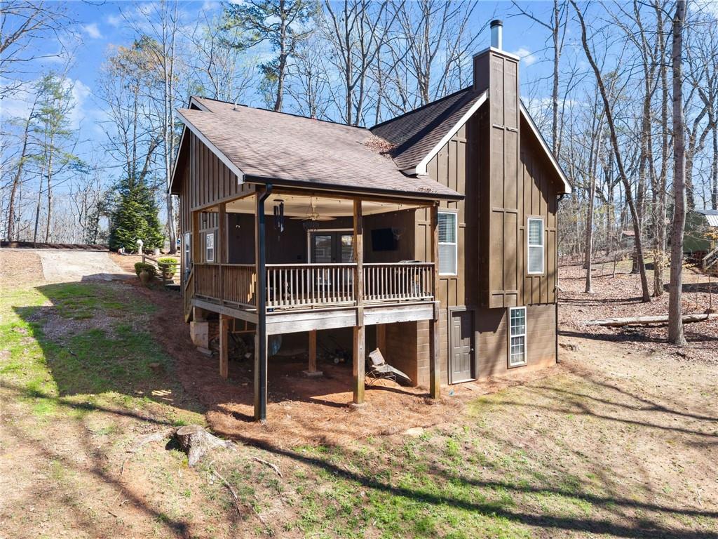 3211 The Trail Road Gainesville, GA 30501 - Photo 26 of 35 a view of a house with a yard and wooden fence