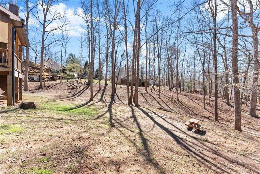 3211 The Trail Road Gainesville, GA 30501 - Photo 30 of 35 a view of a park with a bench