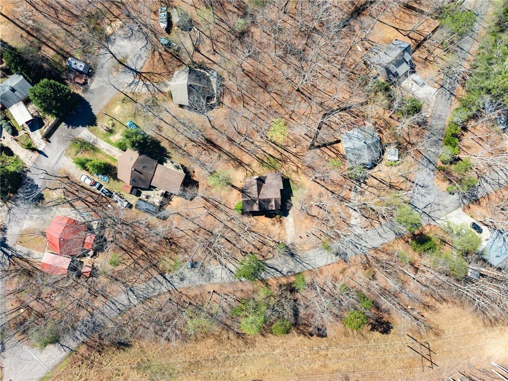 3211 The Trail Road Gainesville, GA 30501 - Photo 34 of 35 a backyard of a house with lots of green space