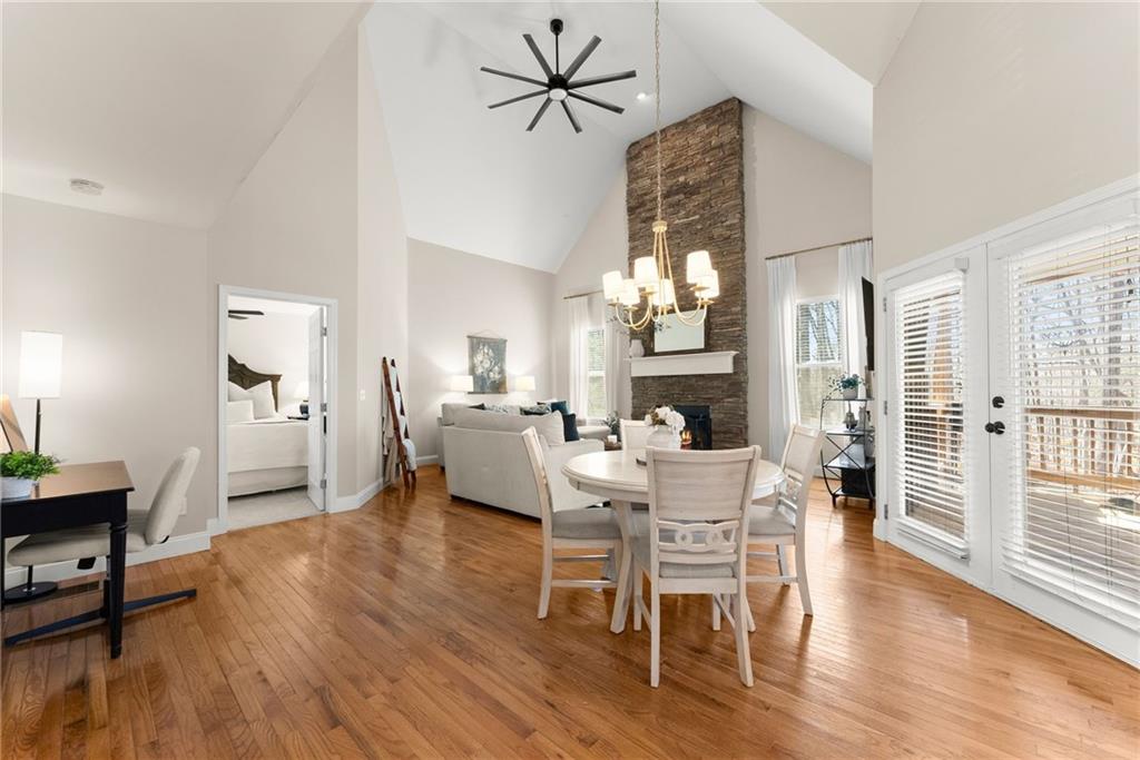 3211 The Trail Road Gainesville, GA 30501 - Photo 8 of 35 a view of a dining room with furniture window and wooden floor