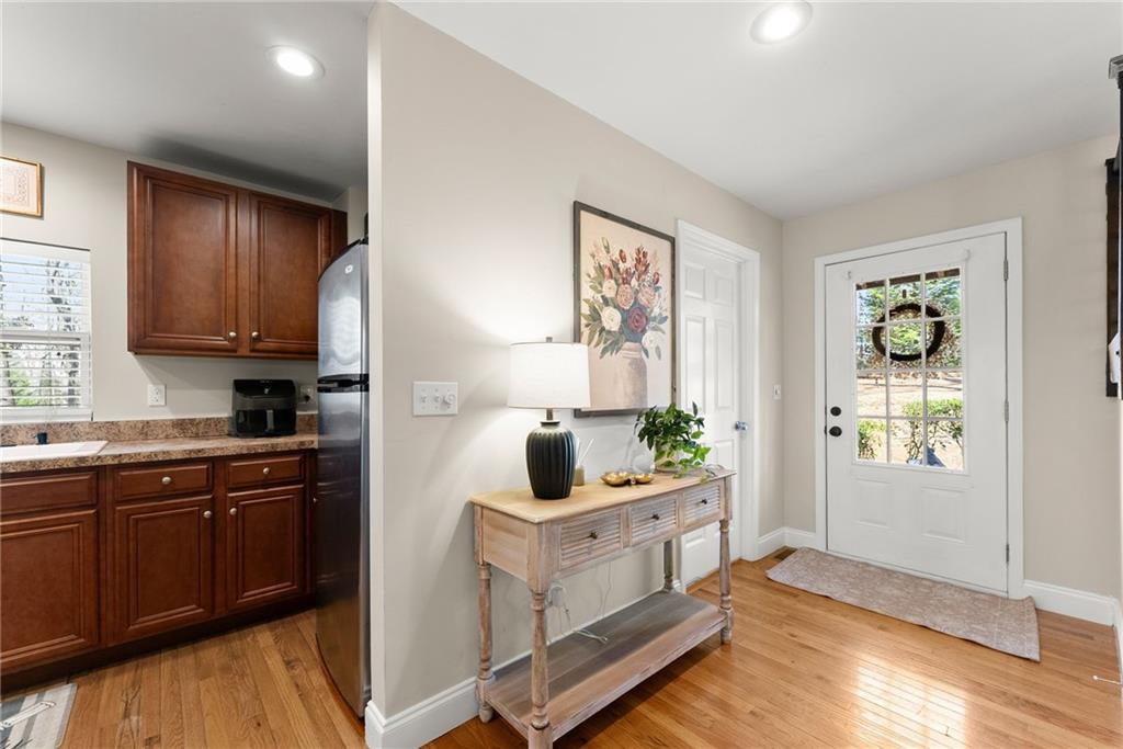 3211 The Trail Road Gainesville, GA 30501 - Photo 9 of 35 a kitchen with sink cabinets and window