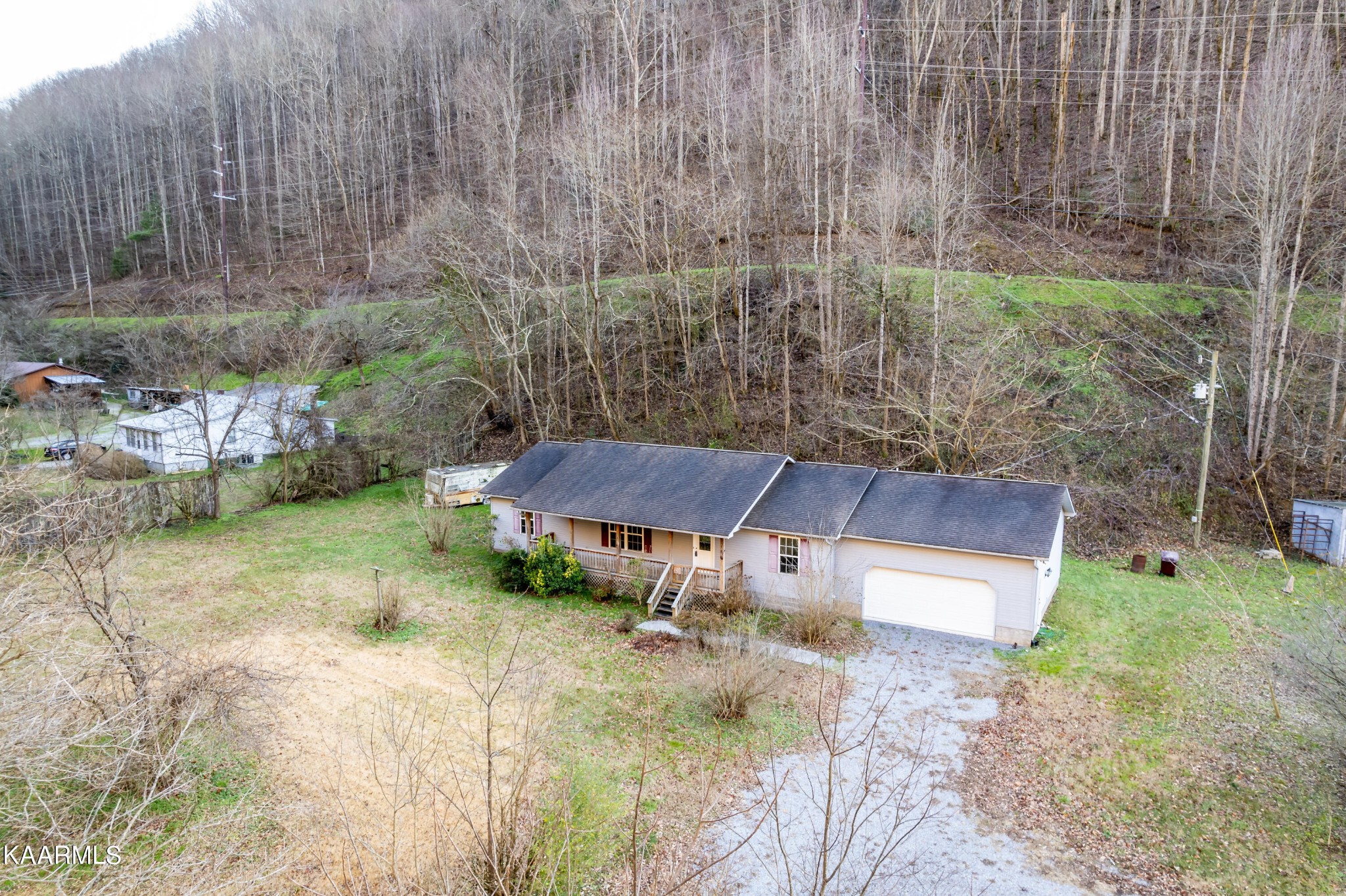 914 Wears Valley Road Townsend, TN 37882 - Photo 39 of 48 a view of a backyard with plants and outdoor seating