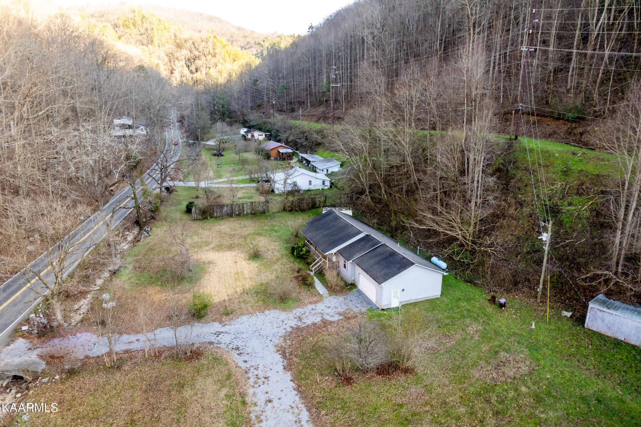 914 Wears Valley Road Townsend, TN 37882 - Photo 40 of 48 a view of a house with a yard