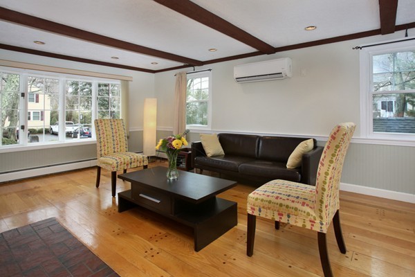 4 Milk Street Lexington, MA 02421 - Photo 3 of 11 a living room with furniture and a large window