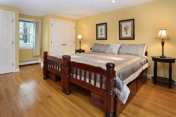 4 Milk Street Lexington, MA 02421 - Photo 8 of 11 a bed room with a bed and a window