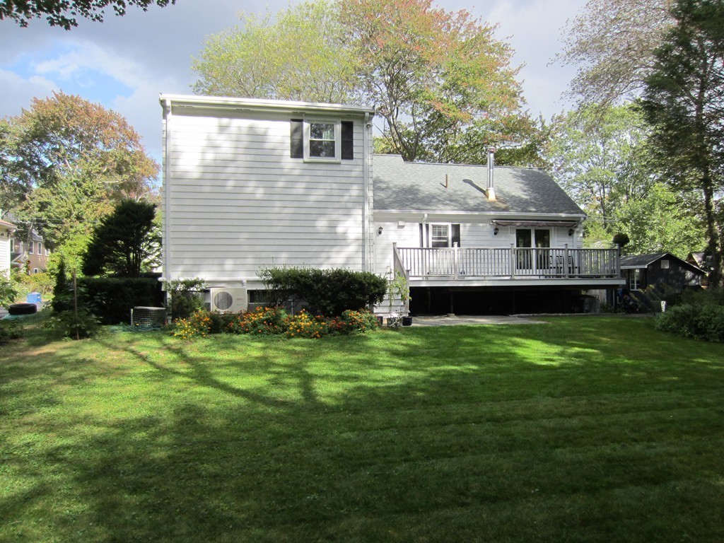 4 Milk Street Lexington, MA 02421 - Photo 10 of 11 a front view of house with yard and green space