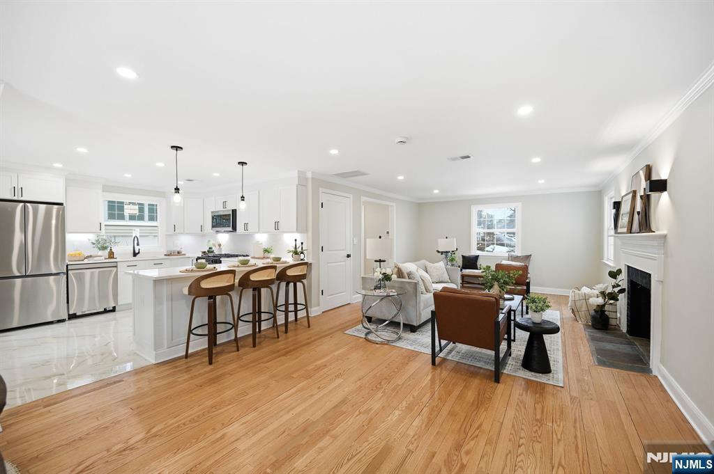 30 West Lawn Road Livingston, NJ 07039 - Photo 11 of 33 a living room with furniture and a wooden floor