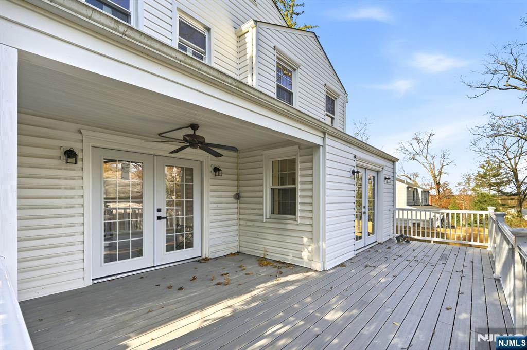 30 West Lawn Road Livingston, NJ 07039 - Photo 28 of 33 a view of a house with a wooden deck