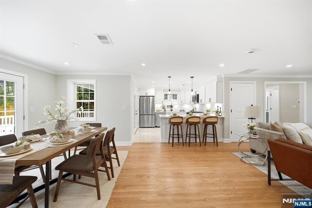 30 West Lawn Road Livingston, NJ 07039 - Photo 10 of 33 a view of a dining room with furniture