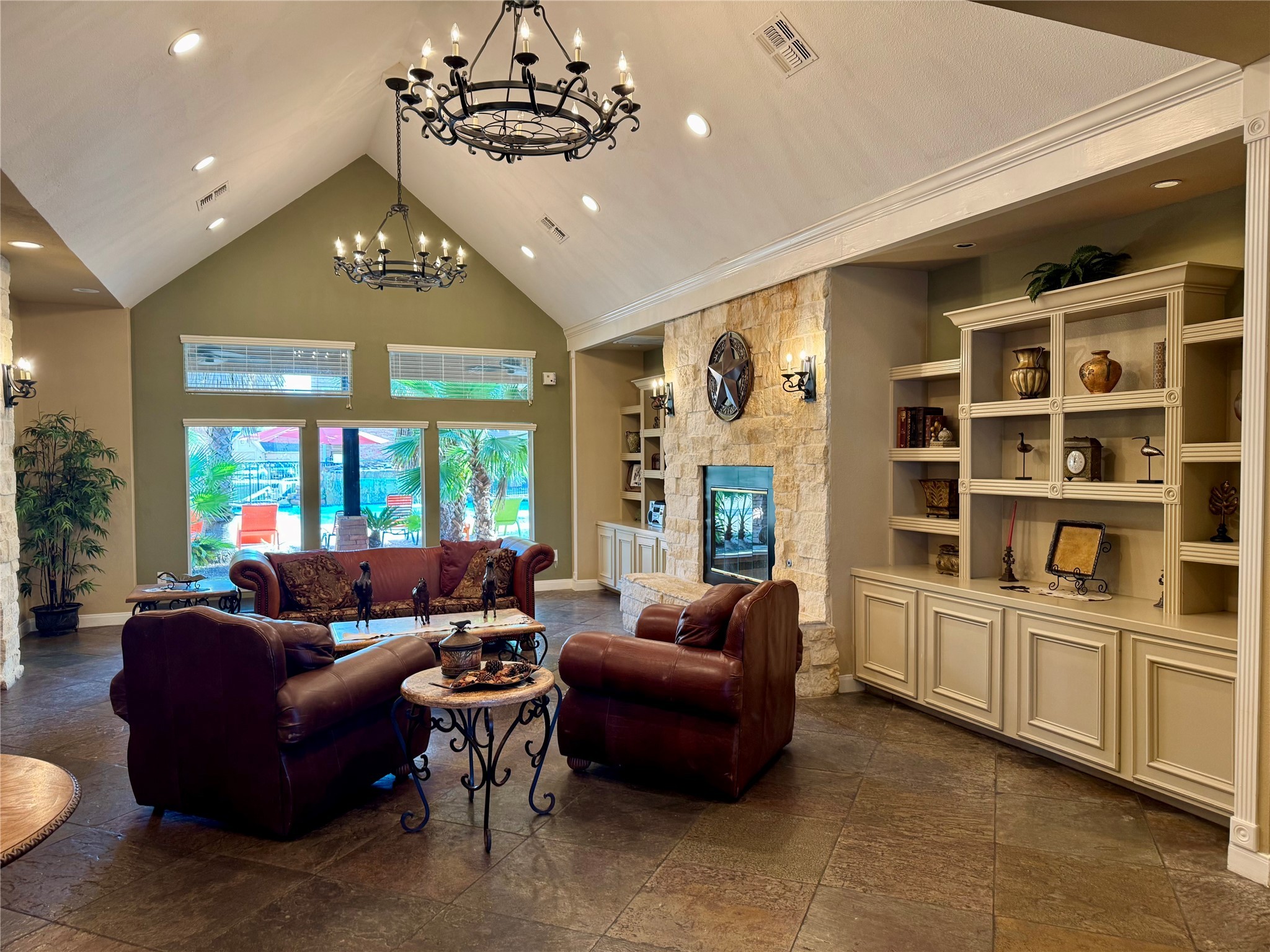 11144 Fuqua Street, Unit 923 Houston, TX 77089 - Photo 2 of 7 a living room with furniture and a chandelier
