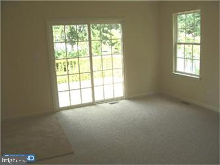 301 East Mill Road Maple Shade, NJ 08052 - Photo 7 of 10 an empty room with a window
