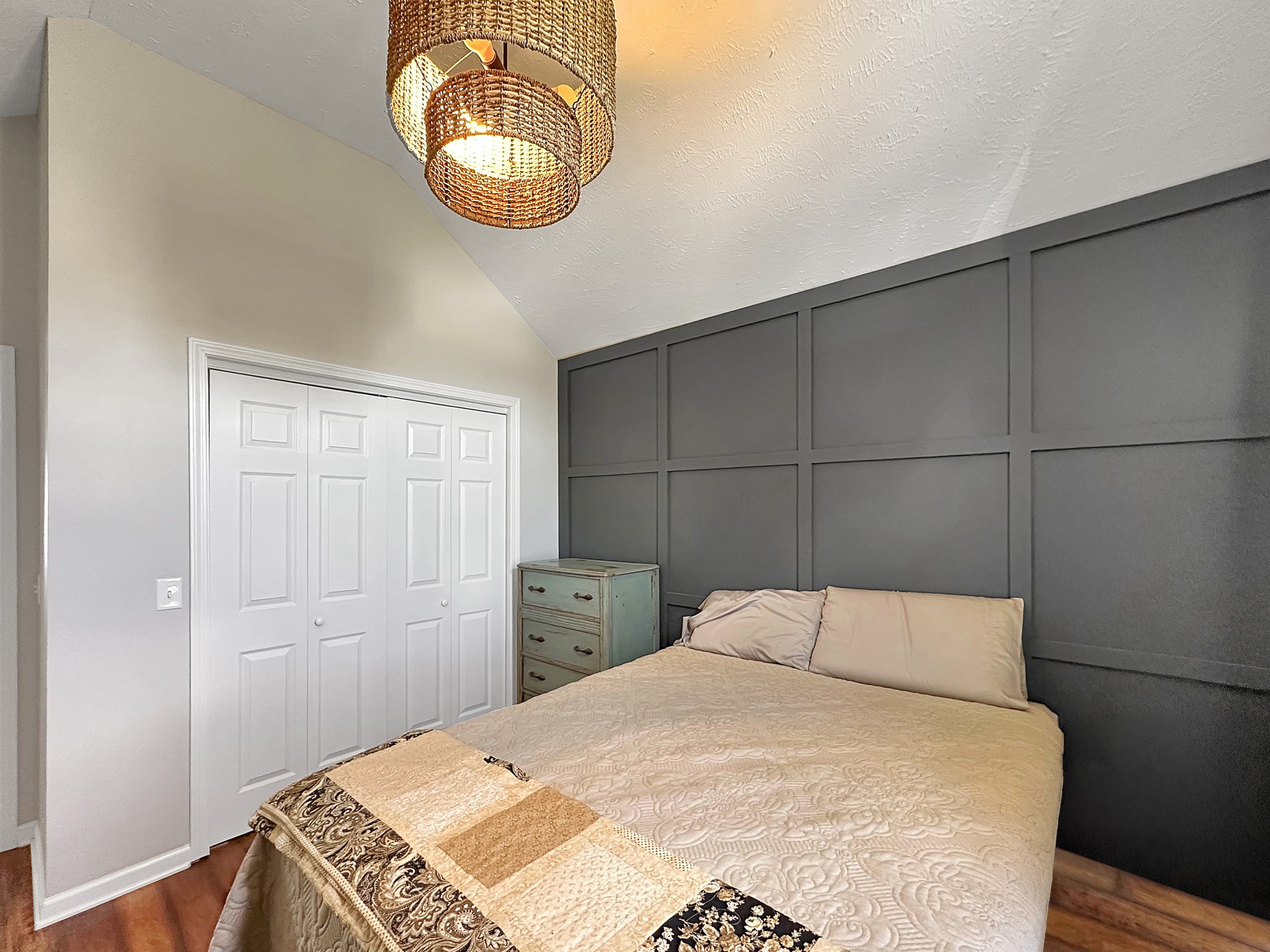 788 Van Dyke Grove Road Paris, TN 38242 - Photo 17 of 34 a bedroom with a bed and chandelier