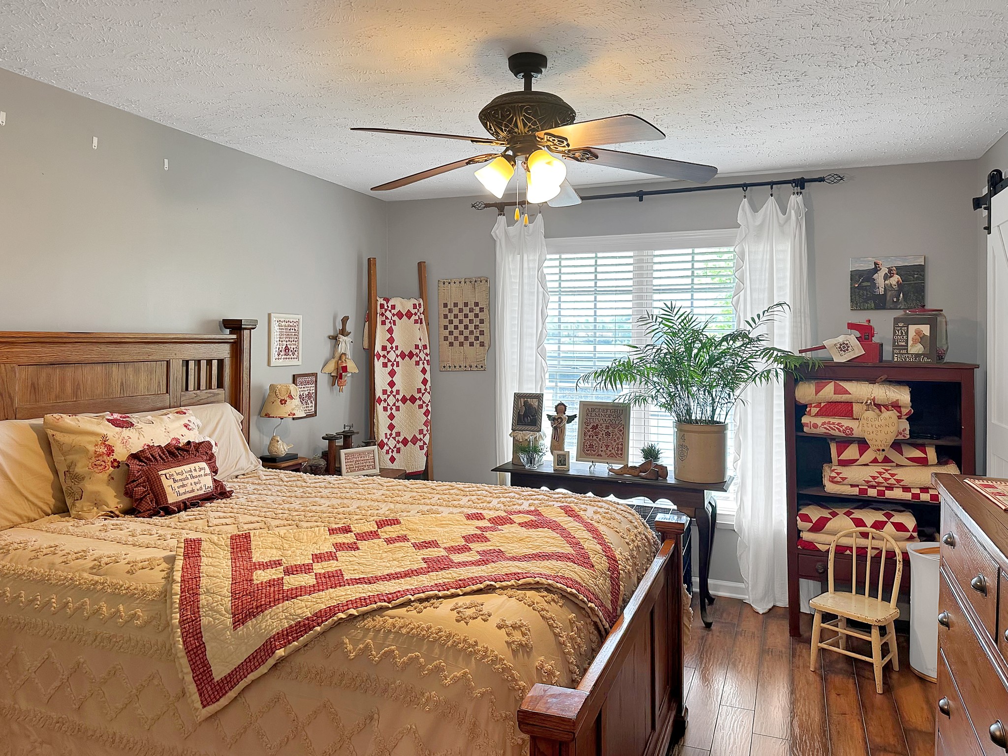 788 Van Dyke Grove Road Paris, TN 38242 - Photo 25 of 34 a bedroom with bed and a chandelier