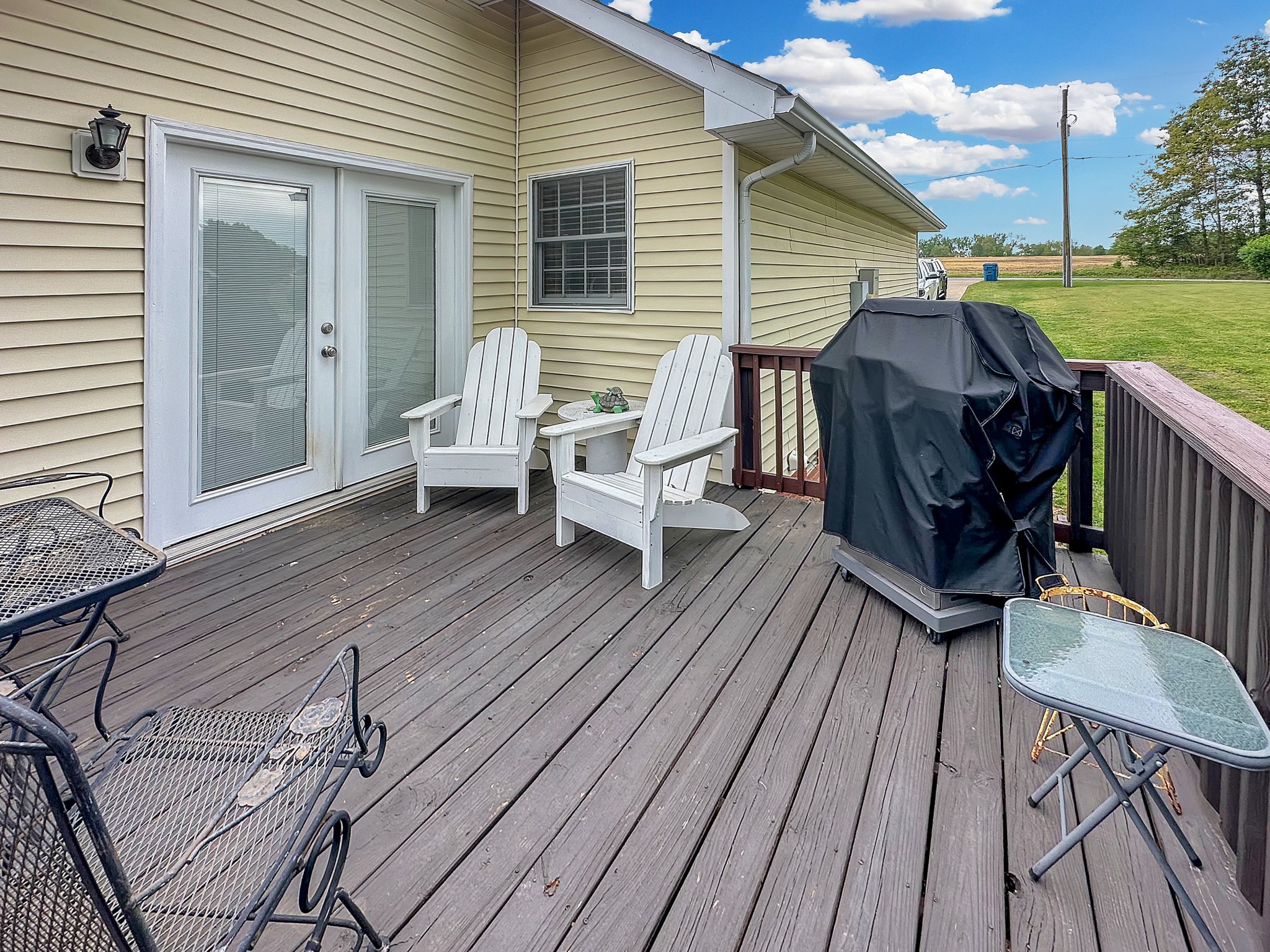 788 Van Dyke Grove Road Paris, TN 38242 - Photo 32 of 34 a view of a deck with wooden floor and outdoor seating