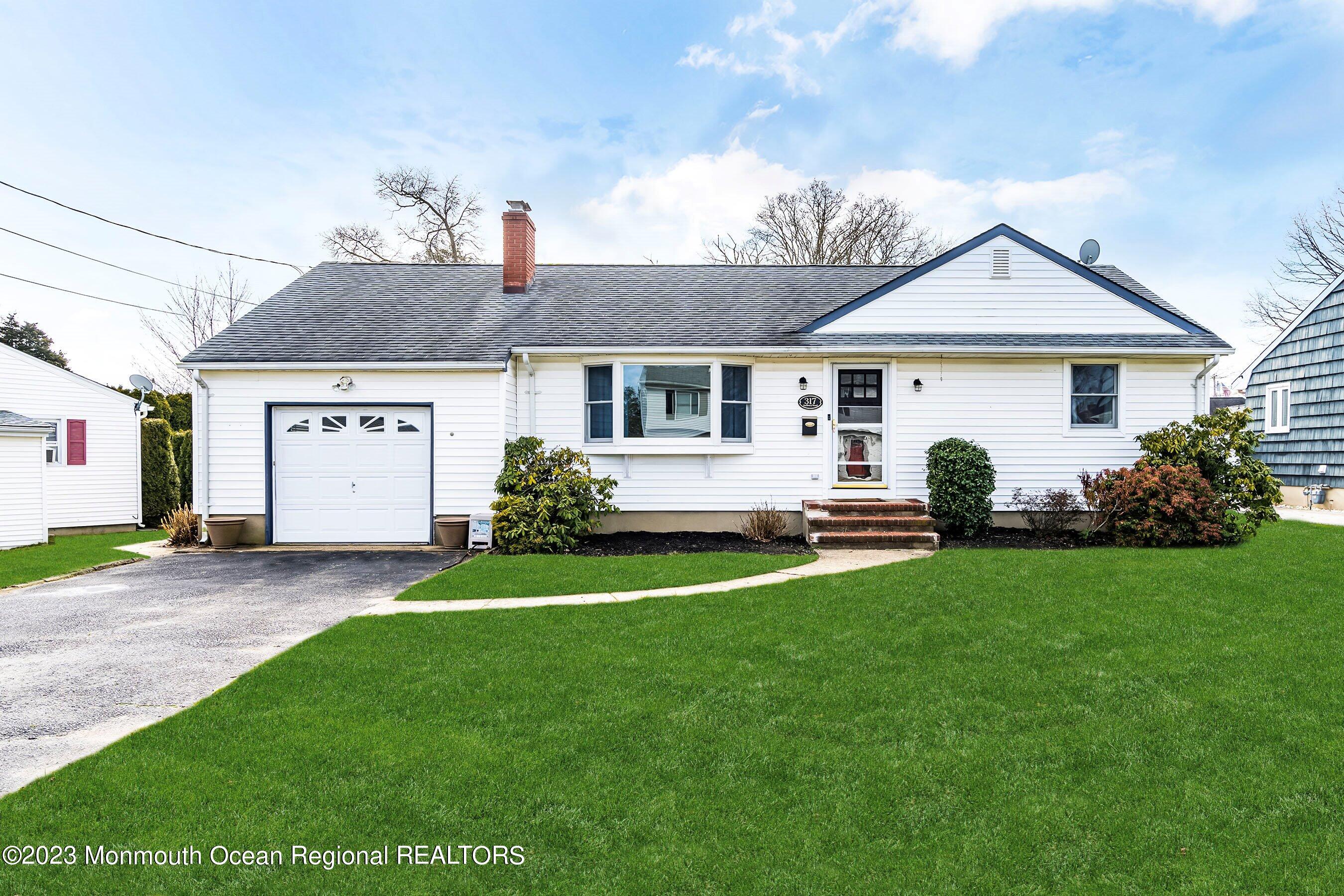 317 Sudbury Road Point Pleasant, NJ 08742 - Photo 1 of 22 01-Front with grass replacement option