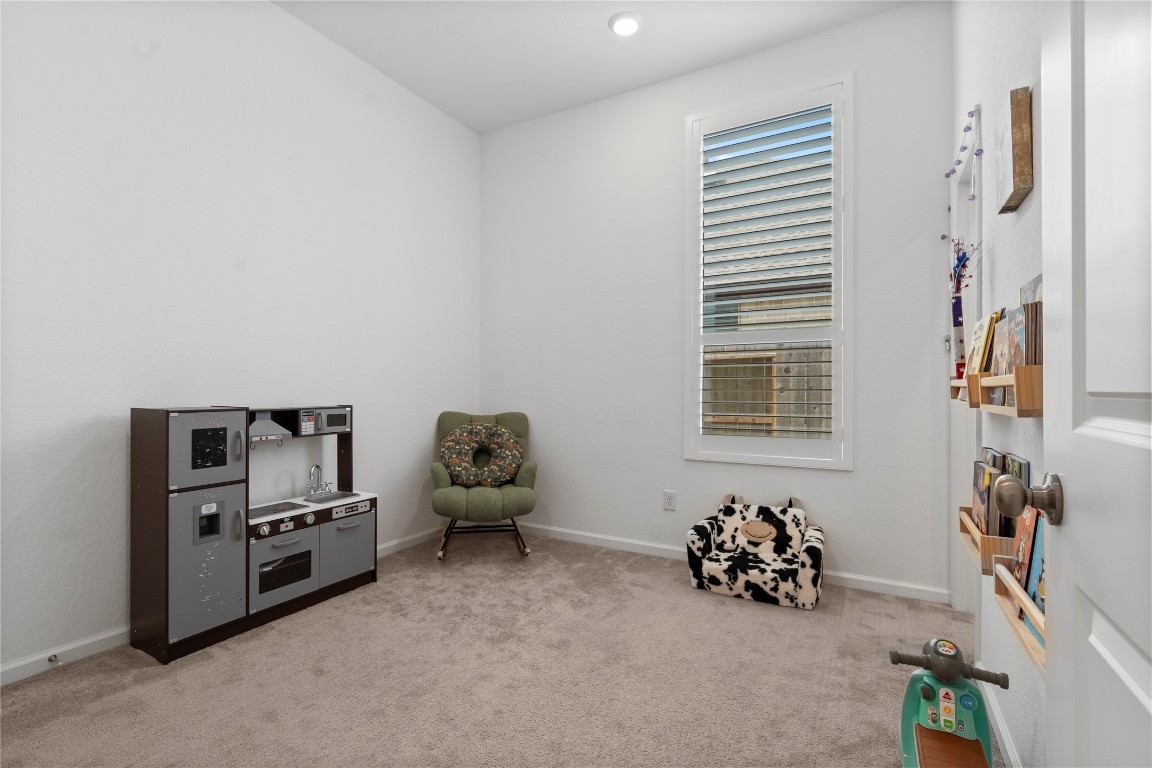 6025 Windward Fls Way Porter, TX 77365 - Photo 18 of 35 a view of livingroom with toys