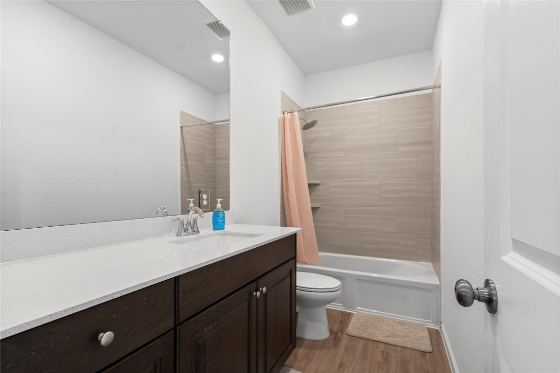 6025 Windward Fls Way Porter, TX 77365 - Photo 31 of 35 a bathroom with a sink a toilet and shower