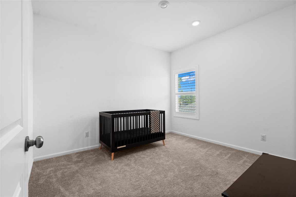 6025 Windward Fls Way Porter, TX 77365 - Photo 32 of 35 an empty room with windows