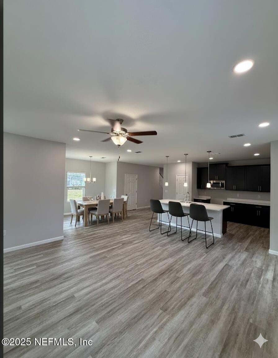 8650 Crystalline Lane Jacksonville, FL 32221 - Photo 7 of 21 a view of a dining room with furniture and chandelier