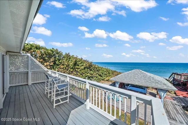 a view of a terrace with sitting area