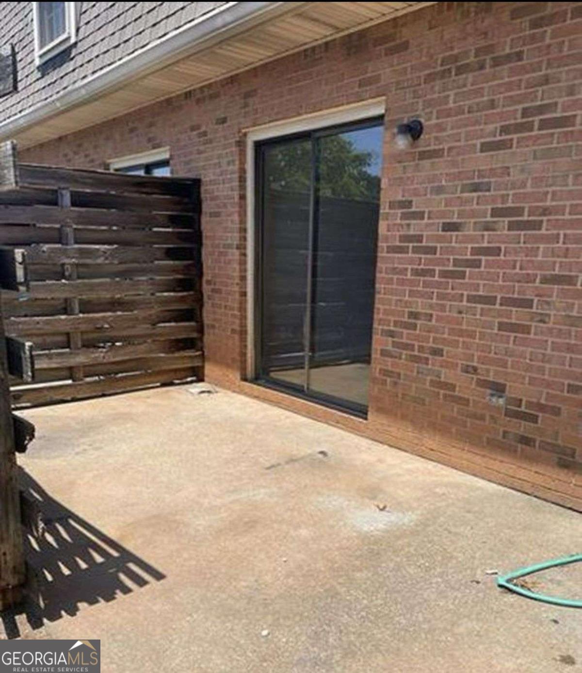 3730 Old Flowery Branch Road, Unit H3 Oakwood, GA 30566 - Photo 11 of 12 a view of a backyard of a house